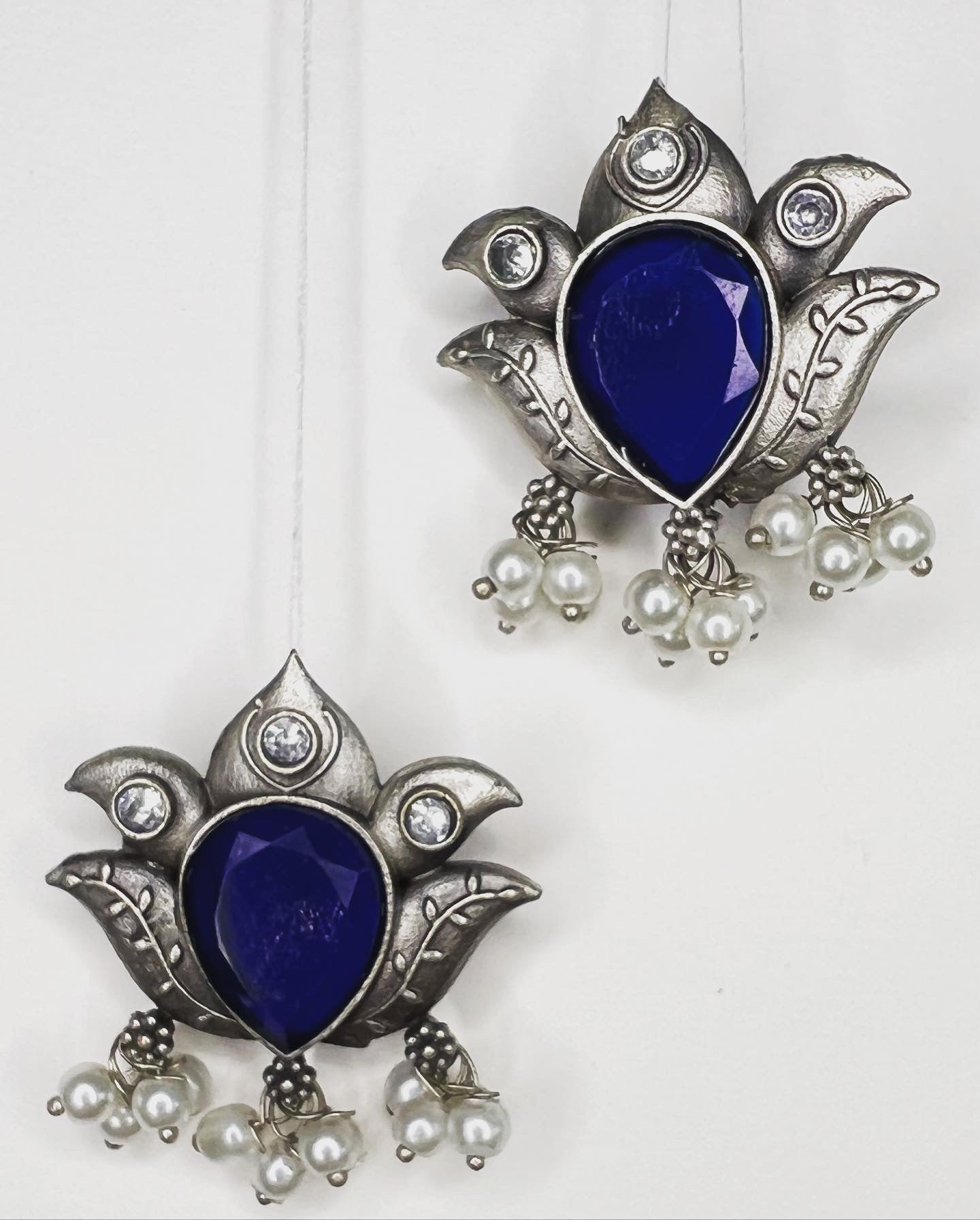 Blue stone lotus earrings